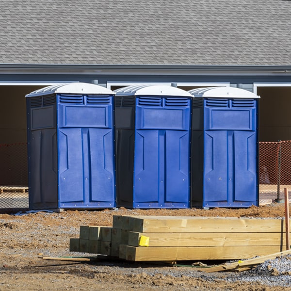 how often are the portable restrooms cleaned and serviced during a rental period in Portland WI